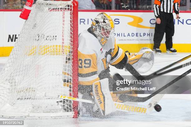 Alex Nedeljkovic of the Pittsburgh Penguins looks at the puck in the second period of the game against the Philadelphia Flyers at the Wells Fargo...