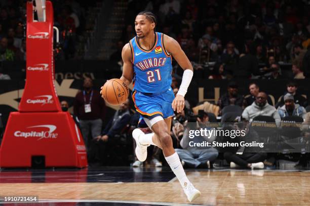 Aaron Wiggins of the Oklahoma City Thunder dribbles the ball during the game against the Washington Wizards on January 8, 2024 at Capital One Arena...