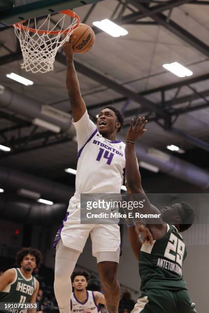 Stanley Johnson of the Stockton Kings shoots as Alex Antetokounmpo of the Wisconsin Herd defends during the game on January 8, 2024 at The Oshkosh...