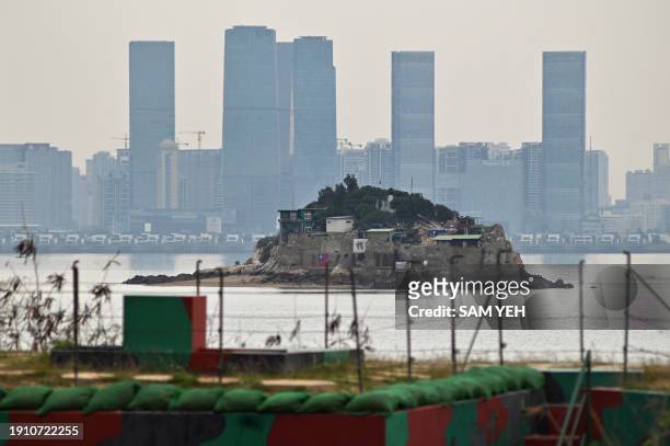 This picture taken on December 6, 2023 shows Taiwan's remote Shihyu islet between China's Xiamen and Taiwan's frontline island of Little Kinmen....