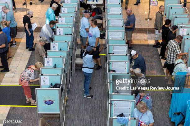 People cast their votes at the polling place inside of the Galleria At Sunset shopping mall in Henderson, Nevada, Saturday, Oct. 22, 2022.