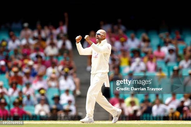 Nathan Lyon of Australia celebrates after claiming the wicket of Mohammad Rizwan of Pakistan during day four of the Men's Third Test Match in the...