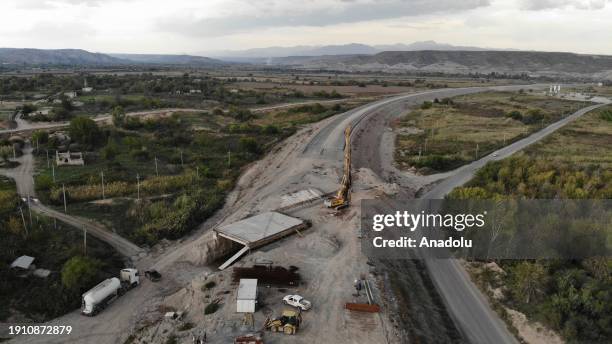 An aerial view of construction of roads and railways continuing that they will pass through the Zangezur Corridor, which will connect the western...