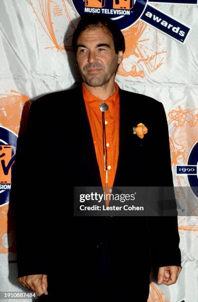 American film director Oliver Stone poses for a portrait backstage during the 1990 MTV Video Music Awards at the Universal Amphitheatre in Los...