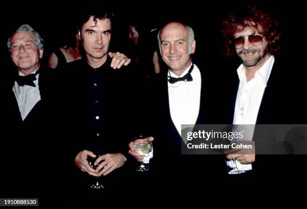 American producers Jerry Leiber and Mike Stoller pose with Scottish singer David Byrne, of the Talking Heads, and English singer Jeff Lynne, of...