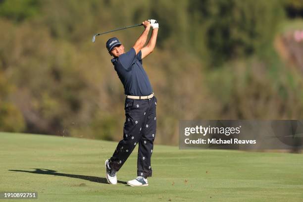 Jason Day of Australia plays an approach shot on the fourth hole during the second round of The Sentry at Plantation Course at Kapalua Golf Club on...