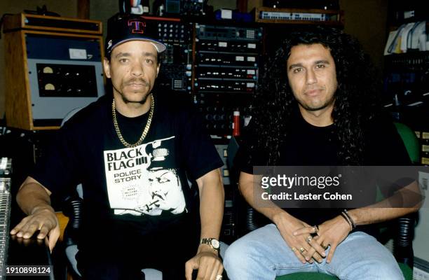 American rapper Ice-T and musician Tom Araya, from the metal group Slayer, pose for a portrait while in studio to work on the medley of three songs...