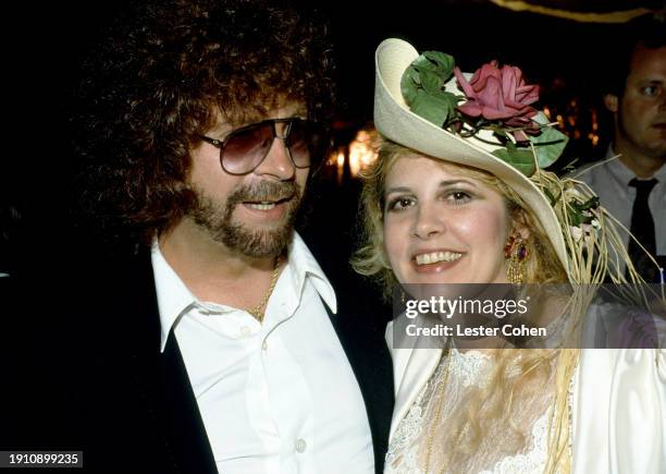 Musicians Stevie Nicks, of the British-American rock band Fleetwood Mac, and Jeff Lynne, of the British-American supergroup Traveling Wilburys, pose...