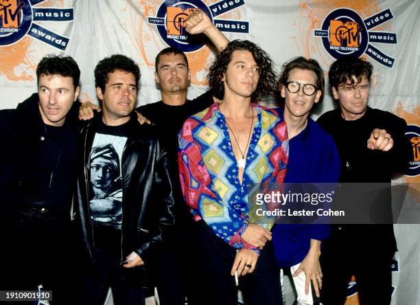 Australian musicians Garry Gary Beers, Andrew Farriss, Jon Farriss, Michael Hutchence , Kirk Pengilly and Tim Farriss, of the Australian rock band...
