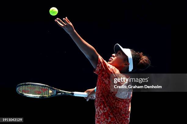 Naomi Osaka of Japan serves during a training session ahead of the 2024 Australian Open at Melbourne Park on January 06, 2024 in Melbourne, Australia.