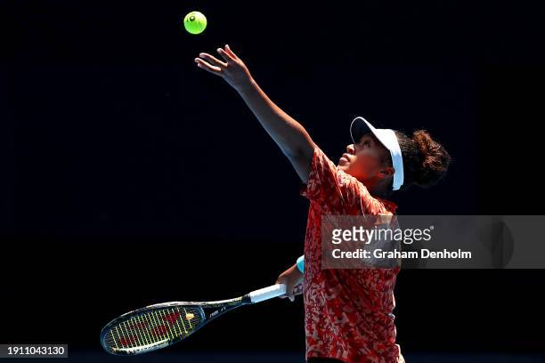 Naomi Osaka of Japan serves during a training session ahead of the 2024 Australian Open at Melbourne Park on January 06, 2024 in Melbourne, Australia.