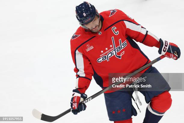 Alex Ovechkin of the Washington Capitals reacts against the Carolina Hurricanes during the third period at Capital One Arena on January 05, 2024 in...
