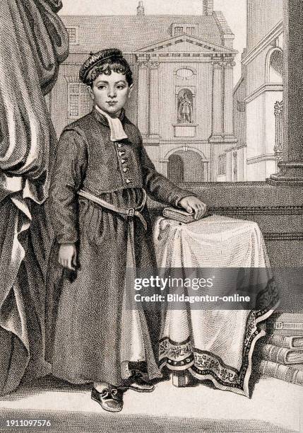 Christ's Hospital, London, one of the boys stands next to a table, his hand on a book, England, historic, digitally restored reproduction from a 19th...