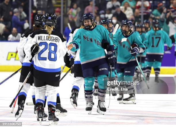 Kaitlin Willoughby 28 of Toronto and Jessie Eldridge of New York shake hands post game at Total Mortgage Arena on January 05, 2024 in Bridgeport,...