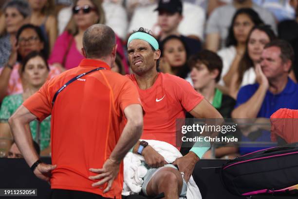 Rafael Nadal of Spain receives treatment in his match against Jordan Thompson of Australia during day six of the 2024 Brisbane International at...
