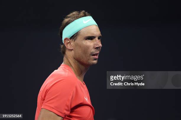 Rafael Nadal of Spain leaves the court for medical treatment in his match against Jordan Thompson of Australia during day six of the 2024 Brisbane...