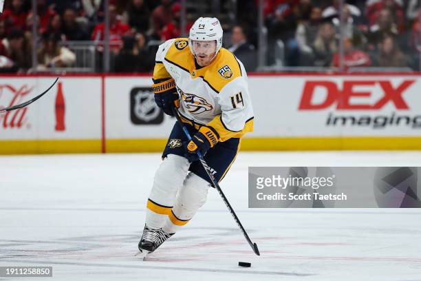 Gustav Nyquist of the Nashville Predators skates with the puck against the Washington Capitals during the third period of the game at Capital One...