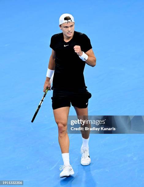 Holger Rune of Denmark celebrates after winning a point in his semi final match against Roman Safiullin of Russia during day seven of the 2024...