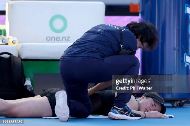 Elina Svitolina of Ukraine receives medical help in her semi final match against Xiyu Wang of China during the 2024 Women's ASB Classic at ASB Tennis...