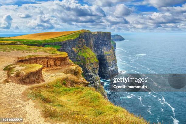 a scenic journey: county clare's cliffs of moher unveiled in ireland - unveiled stock pictures, royalty-free photos & images