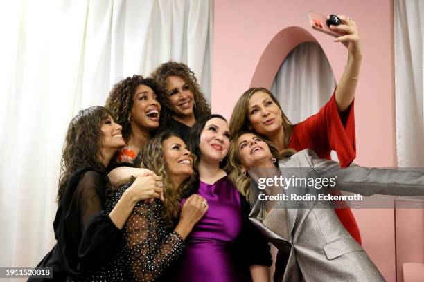 Eva Longoria, Gina Torres, Lisa Vidal, Diana Maria Riva, Gloria Calderón Kellett, Natalie Morales and Constance Marie attend La Cena Los Angeles at...