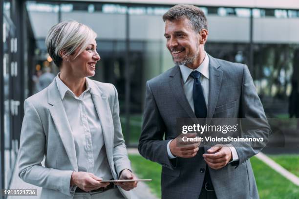 making decision on the move. - formal businesswear stock pictures, royalty-free photos & images