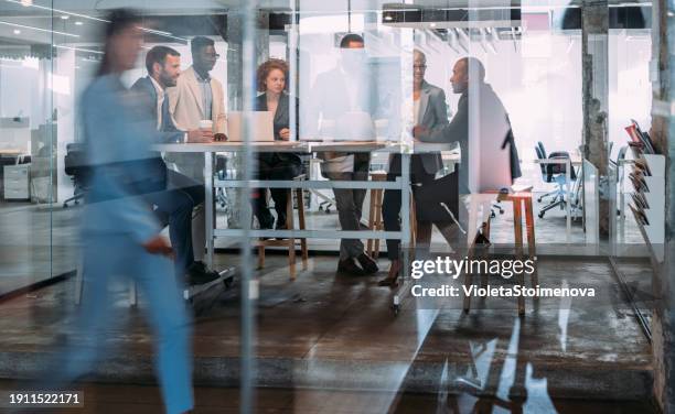 business persons on meeting in the office. - blurred motion business stock pictures, royalty-free photos & images