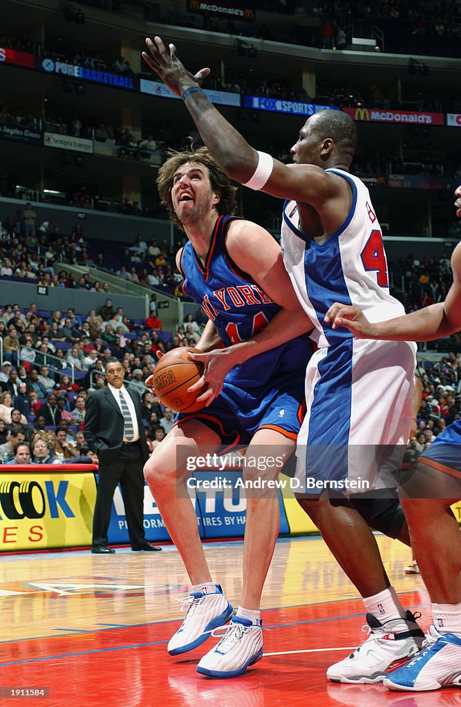 Travis Knight goes to the basket
