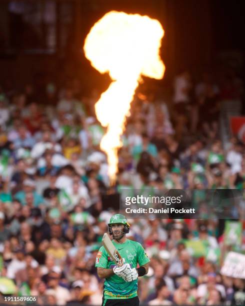 Glenn Maxwell of the Stars reacts after hitting a boundary during the BBL match between Melbourne Stars and Sydney Sixers at Melbourne Cricket...