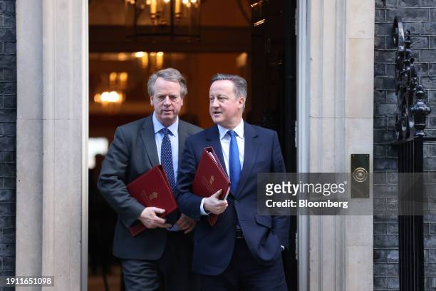 Alister Jack, UK Scottish secretary, left, and David Cameron, UK foreign secretary, depart following a weekly meeting of cabinet ministers at 10...