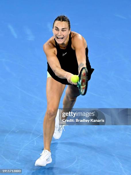 Aryna Sabalenka of Belarus plays a backhand in her semi final match against Victoria Azarenka of Belarus during day seven of the 2024 Brisbane...