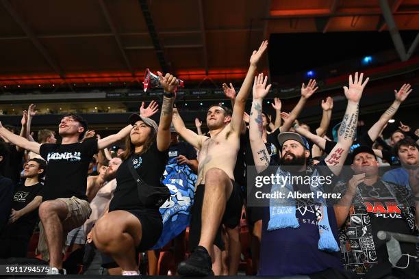 Sydney FC fans celebrate the victory during the A-League Men round 11 match between Brisbane Roar and Sydney FC at Suncorp Stadium, on January 06 in...