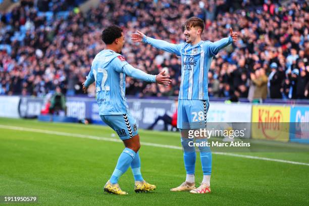 Joel Latibeaudiere of Coventry City celebrates with Josh Eccles of Coventry City after scoring his team's first goal during the Emirates FA Cup Third...
