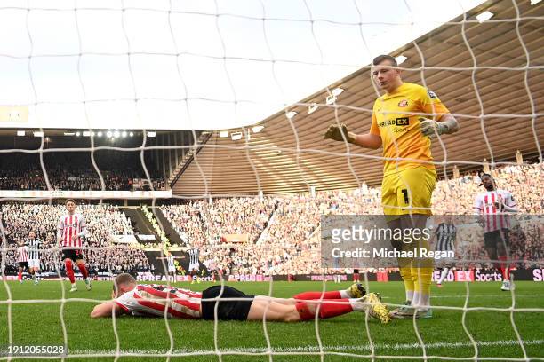 Anthony Patterson and Daniel Ballard of Sunderland react after an own goal, Newcastle United's first goal during the Emirates FA Cup Third Round...