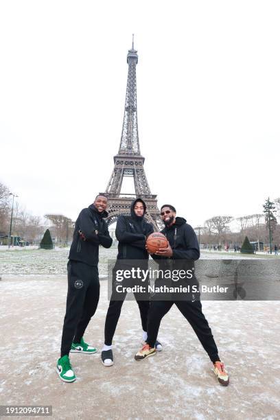 Harry Giles, Trendon Watford and Royce O'Neale of the Brooklyn Nets takes a photo as part of the 2024 NBA Paris Games at the Eiffel Tower on January...