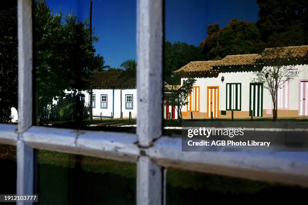 Colored houses, Reflex, Pirinópolis, Goias, Brazil.