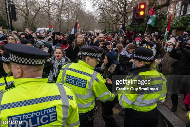 Police scuffle with protesters at St James Park as over a thousand people attend the Palestine protest called by Sisters Uncut and others on January...