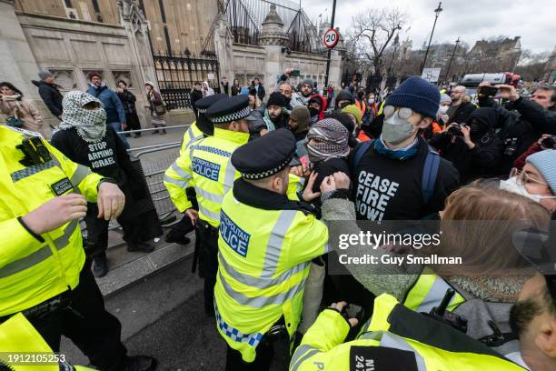 Police scuffle with protesters next to Parliament as over a thousand people attend the Palestine protest called by Sisters Uncut and others on...