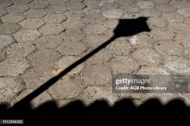 Shadow of Lamp, Pirinópolis, Goias, Brazil.