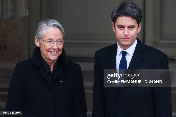 Newly appointed Prime minister Gabriel Attal is welcomed by outgoing Prime minister Elisabeth Borne as he arrives for the handover ceremony at the...