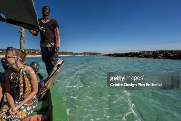 Tourists In A Dhow On Benguerra Island, The Second Largest Island In The Bazaruto Archipelago. Mozambique.