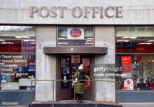 Customer walks into the Mount Pleasant Post Office in Central London.