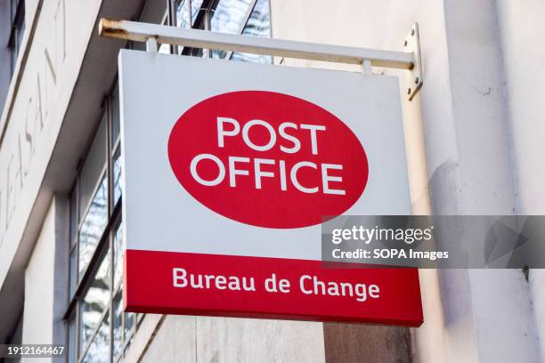 General view of a sign at a post office in Central London.