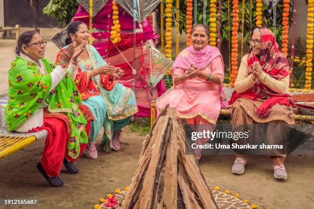 lohri celebration - lohri stock pictures, royalty-free photos & images