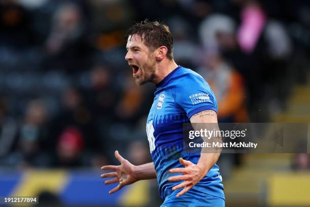 Lukas Jutkiewicz of Birmingham City celebrates scoring his team's first goal during the Emirates FA Cup Third Round match between Hull City and...