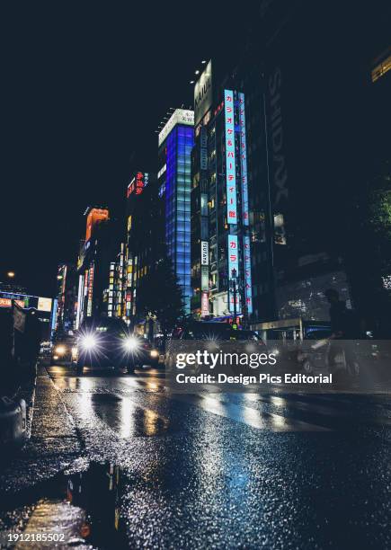 Shinjuku street at night. Tokyo, Kanto, Japan.