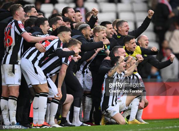 The Newcastle squad pose for a celebration picture after the Emirates FA Cup Third Round match between Sunderland and Newcastle United at Stadium of...