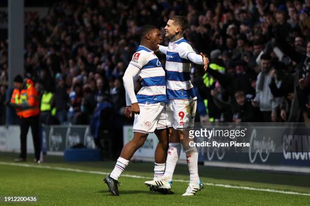 Lyndon Dykes of Queens Park Rangers celebrates scoring his team's second goal with teammate Sinclair Armstrong during the Emirates FA Cup Third Round...