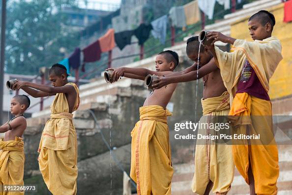 Young brahmin students performing rituals; Varanasi, India Young brahmin students performing rituals; Varanasi, India