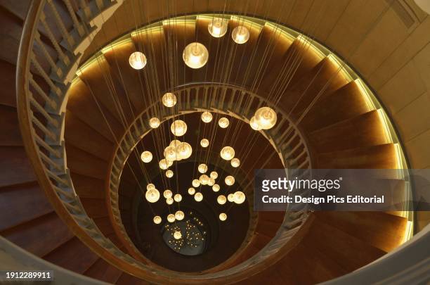 Spiral Staircase With Lights At Heal's Department Store, Tottenham Court Road. London, England.